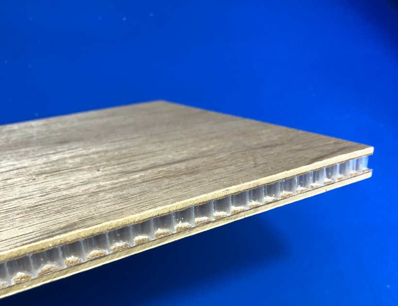 Sandwich composite honeycomb board for wall system